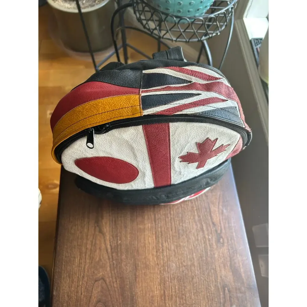 Vintage Wilsons Leather Multi-National backpack leather flag USA Japan Canada